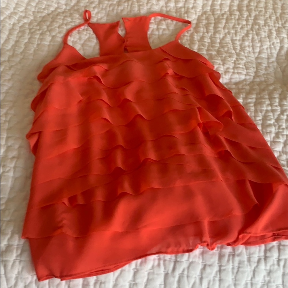 Orange ruffle top